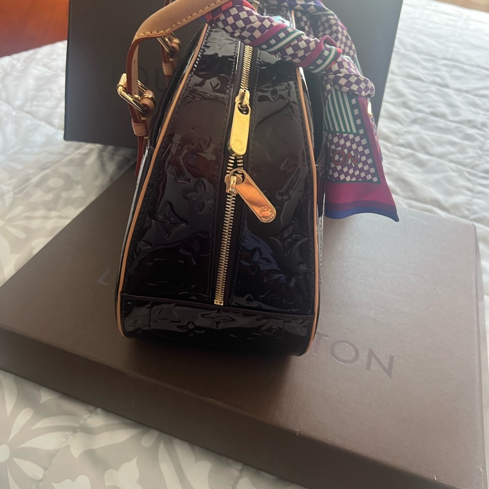 Louis Vuitton Black Patent Leather Bag with Gold Accents